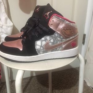 Pink and black Nike air Jordans